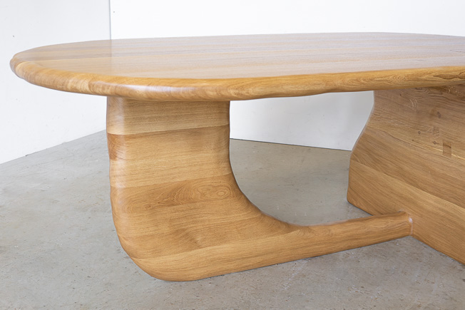 curved dining table in oak