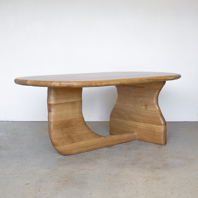 curved dining table in oak