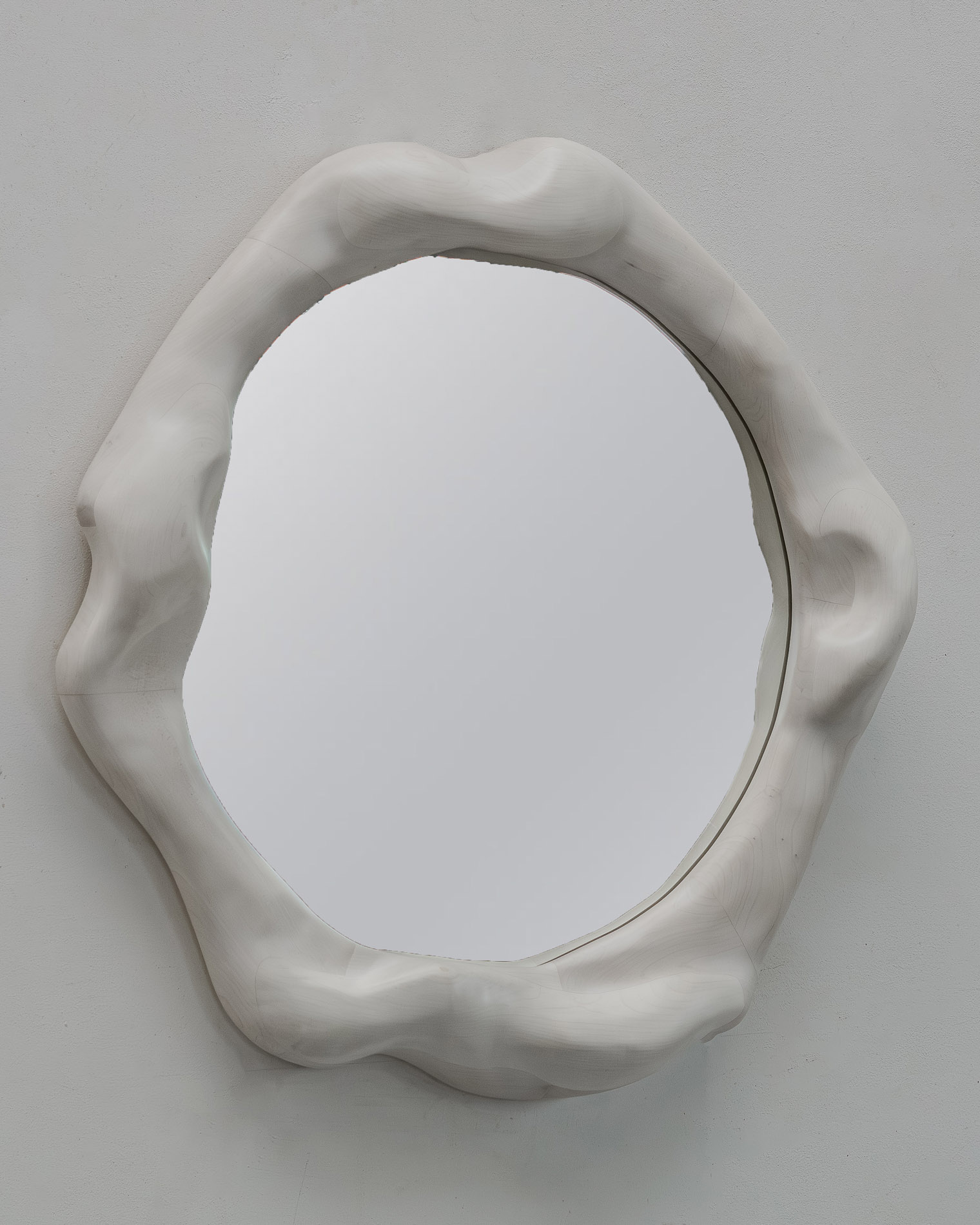 Sculptural mirror in bleached maple