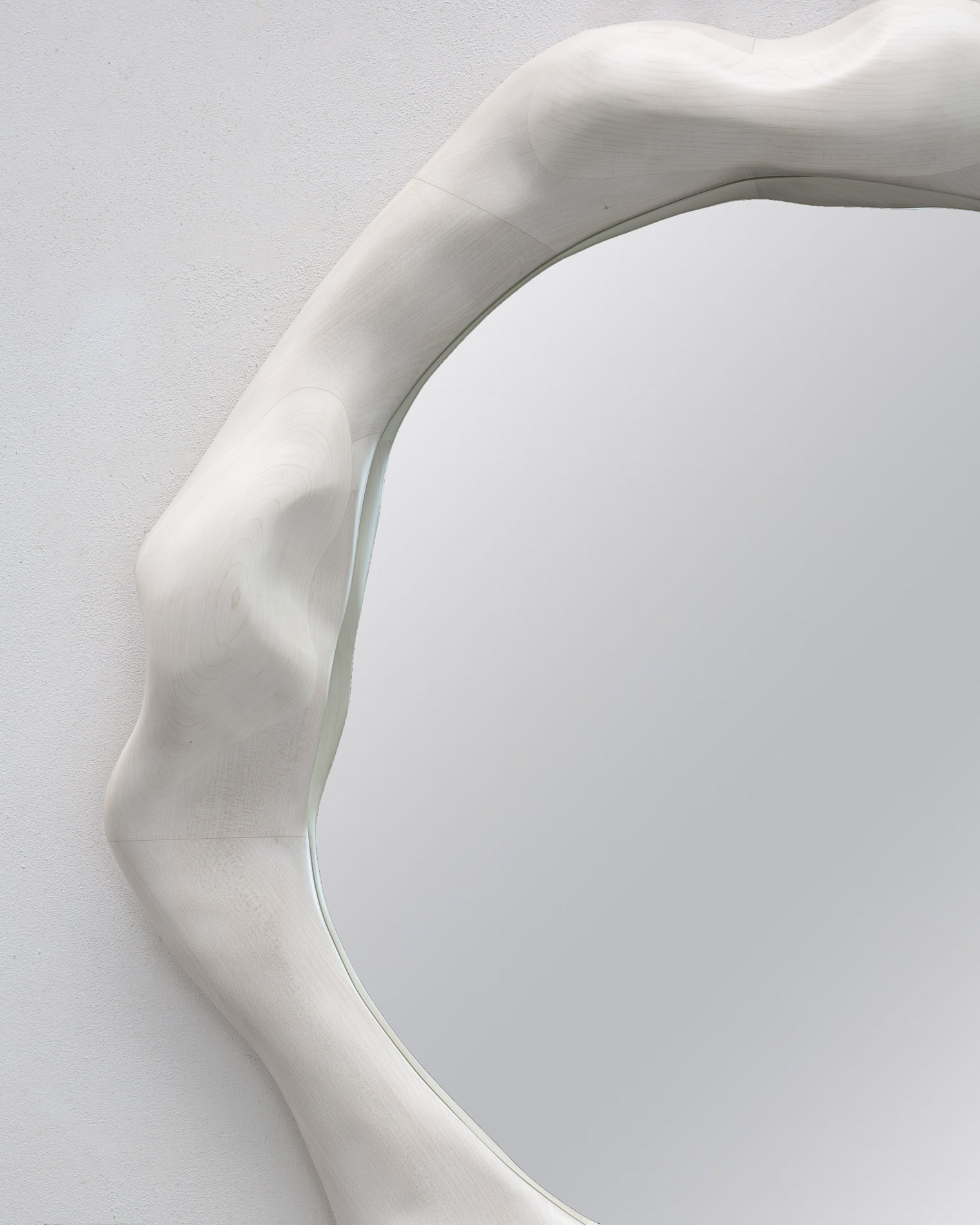 Sculptural mirror in bleached maple