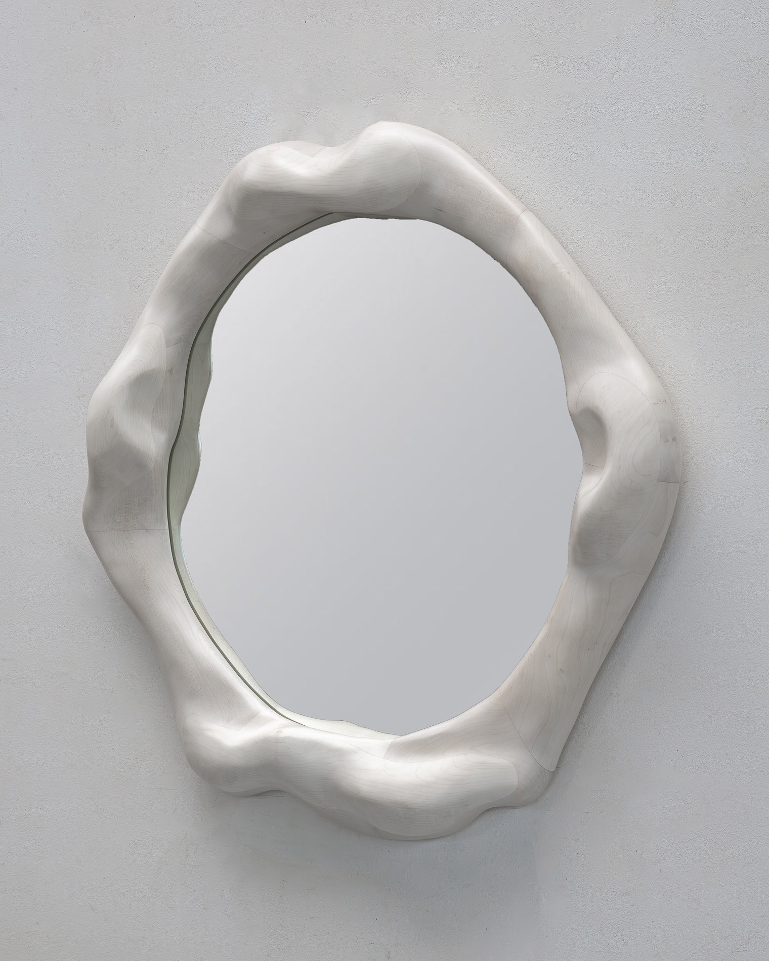 Sculptural mirror in bleached maple