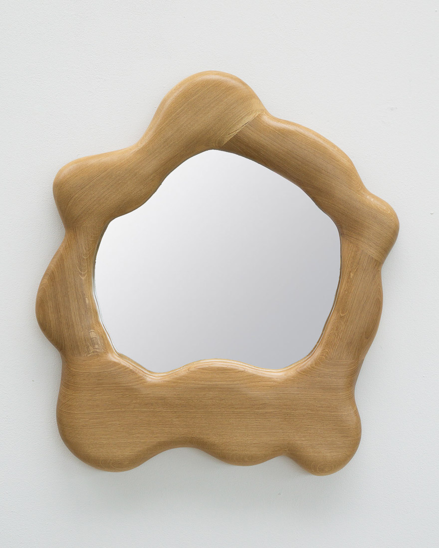 sculptural mirror in oak wood