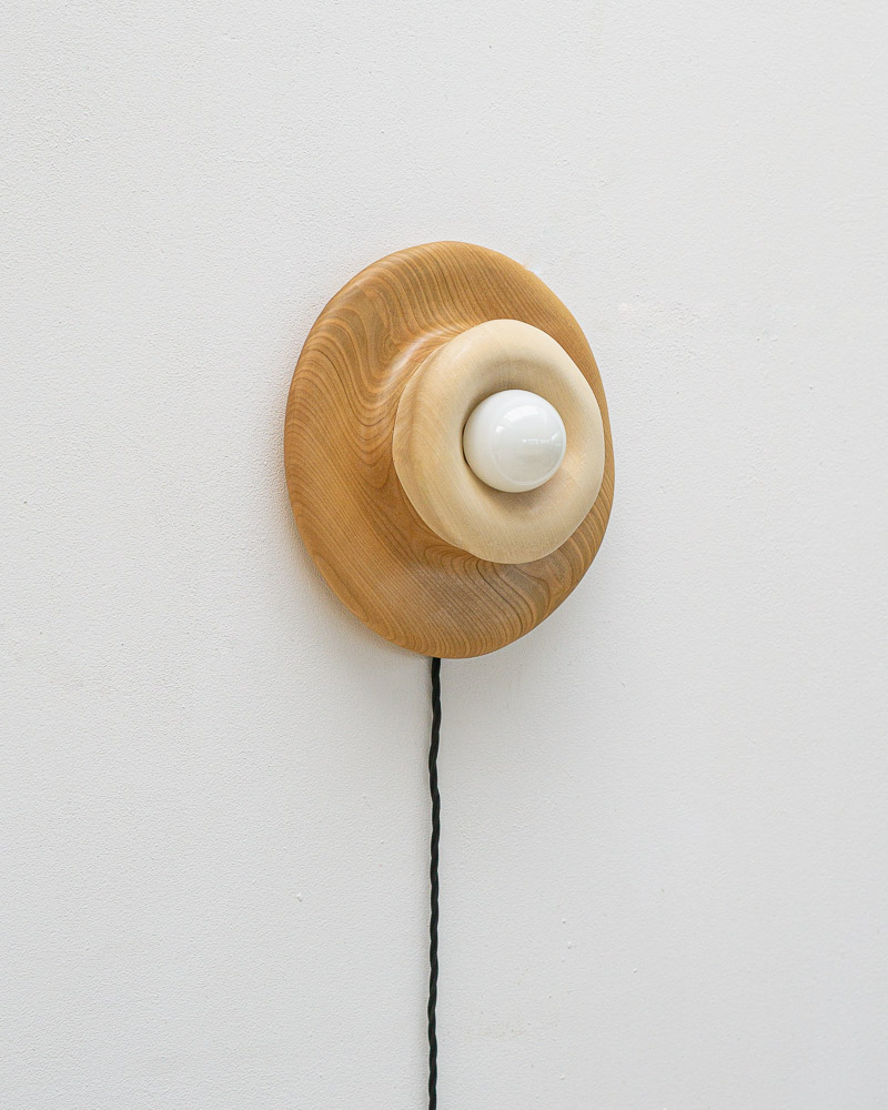 round wall lamp in cherry and maple wood