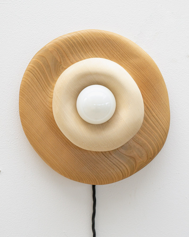 round wall lamp in cherry and maple wood