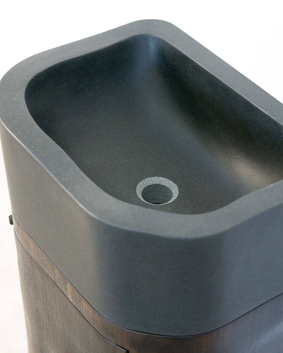 Vanity in walnut with stone sink