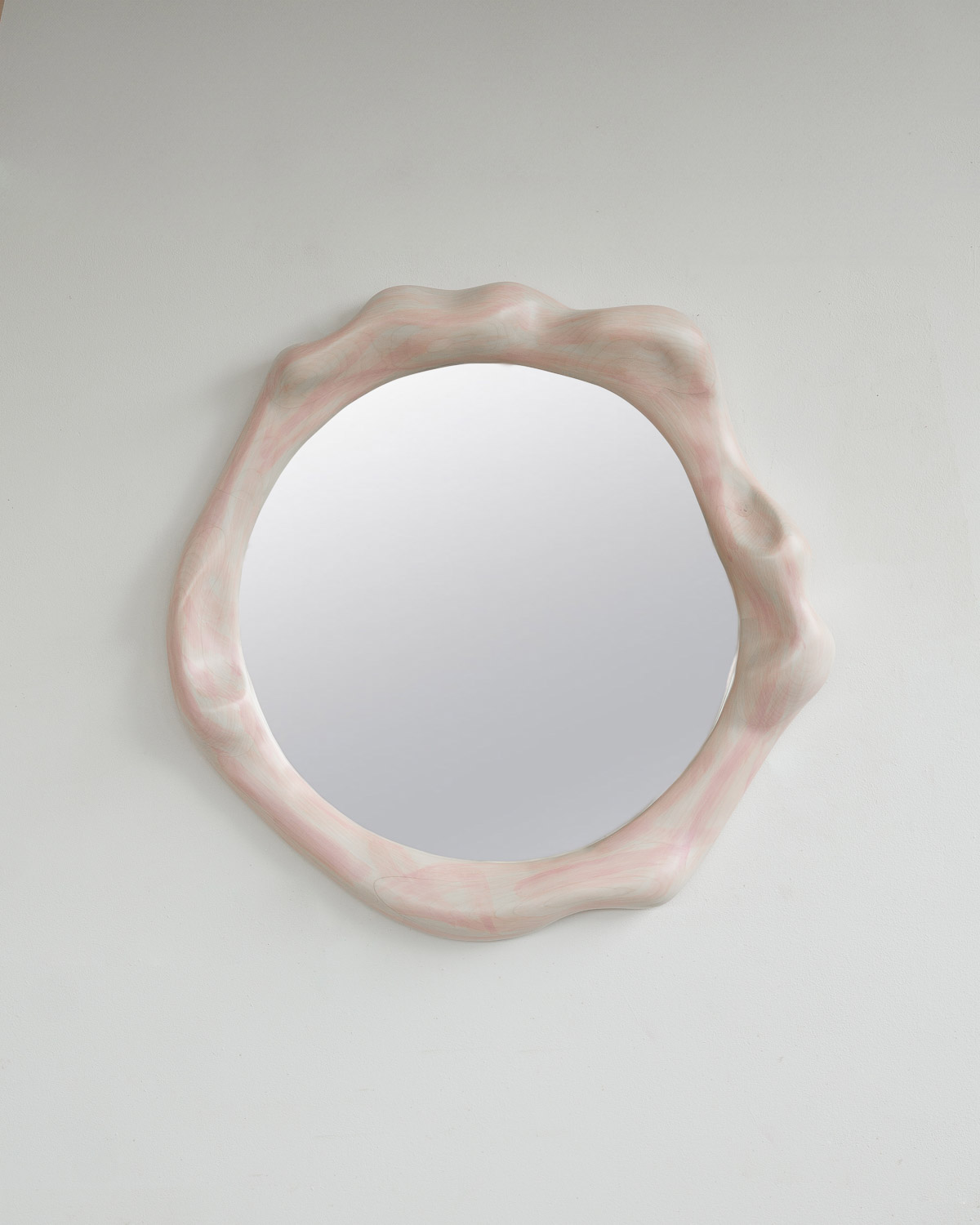 mirror sculptural in rosa painted maple