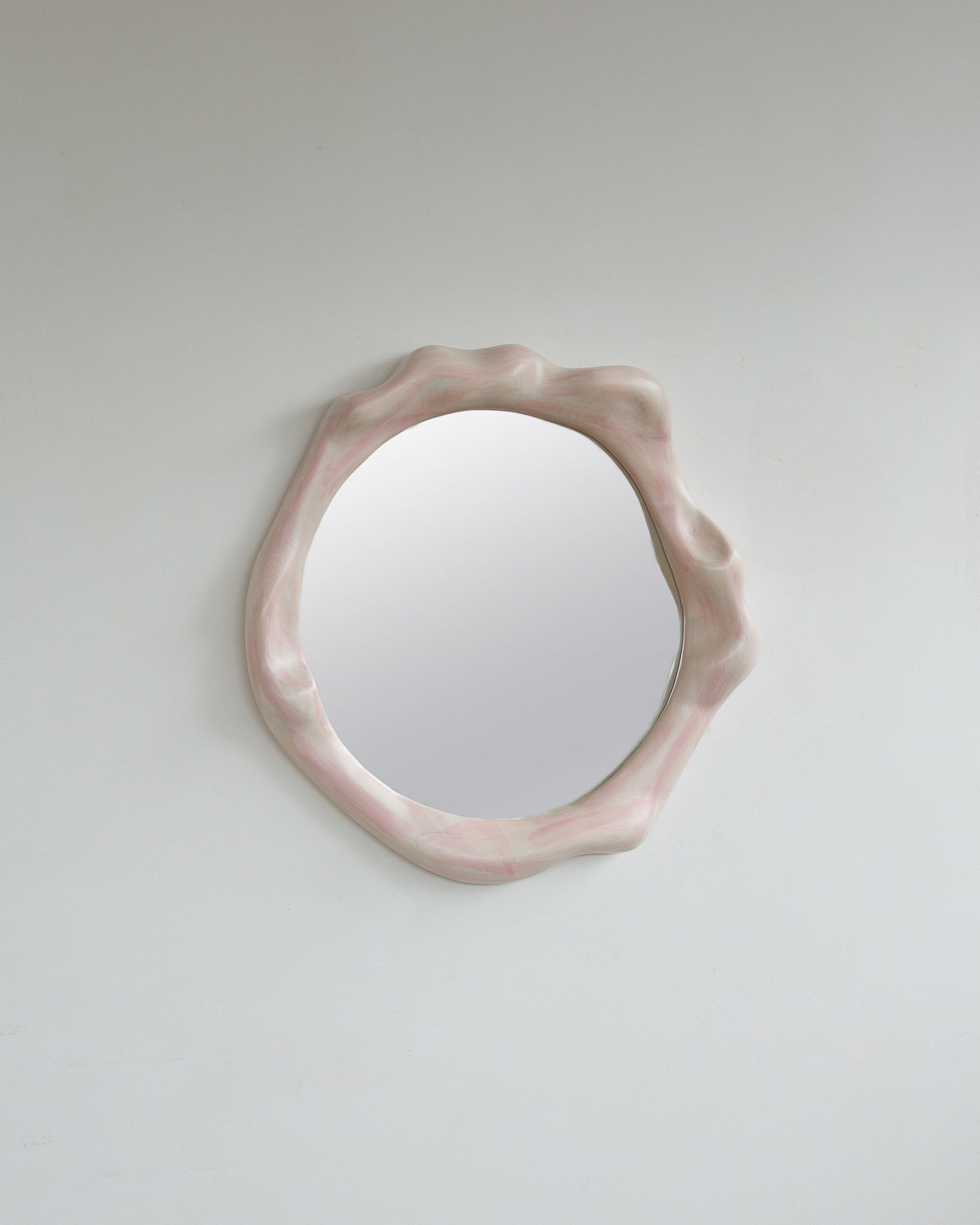mirror sculptural in rosa painted maple