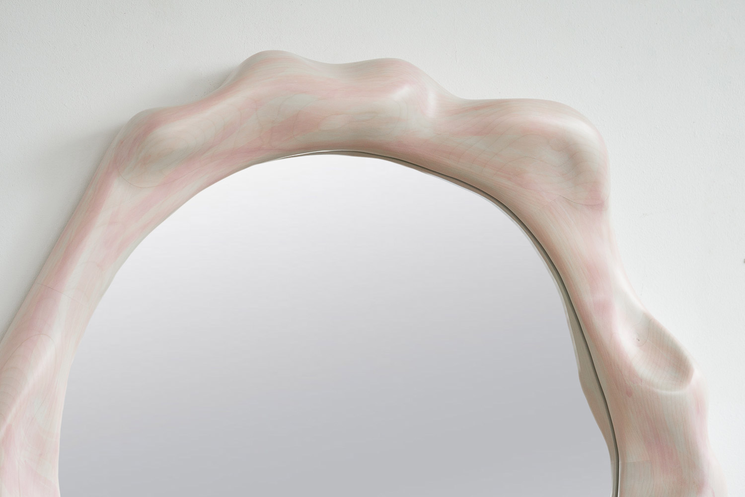 mirror sculptural in rosa painted maple