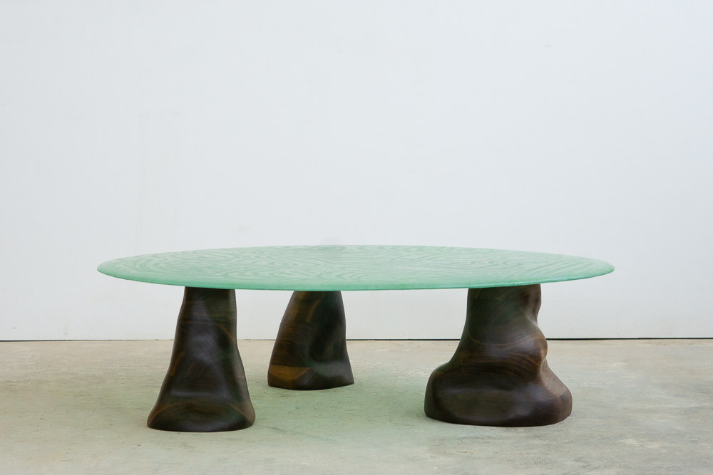 green powdered glass coffee table with walnut legs