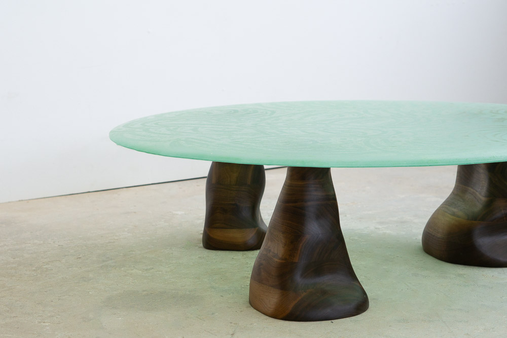 green powdered glass coffee table with walnut legs