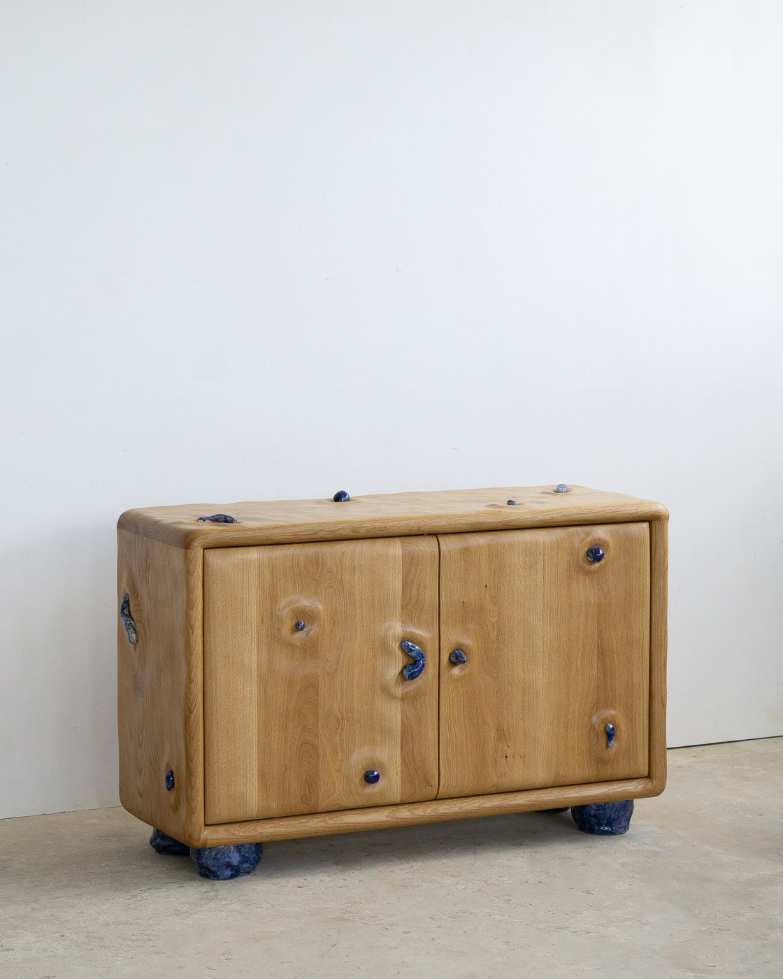 credenza in white oak with blue ceramic inlays