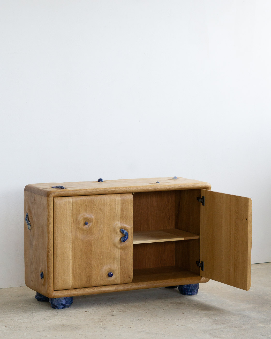 credenza in white oak with blue ceramic inlays