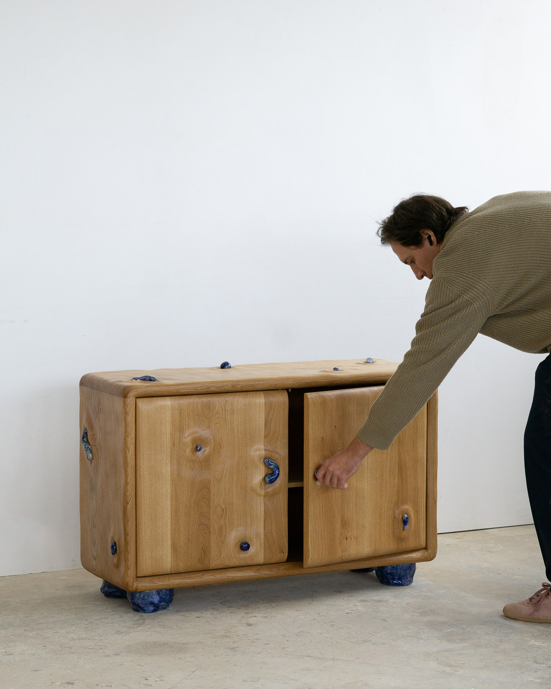 credenza in white oak with blue ceramic inlays