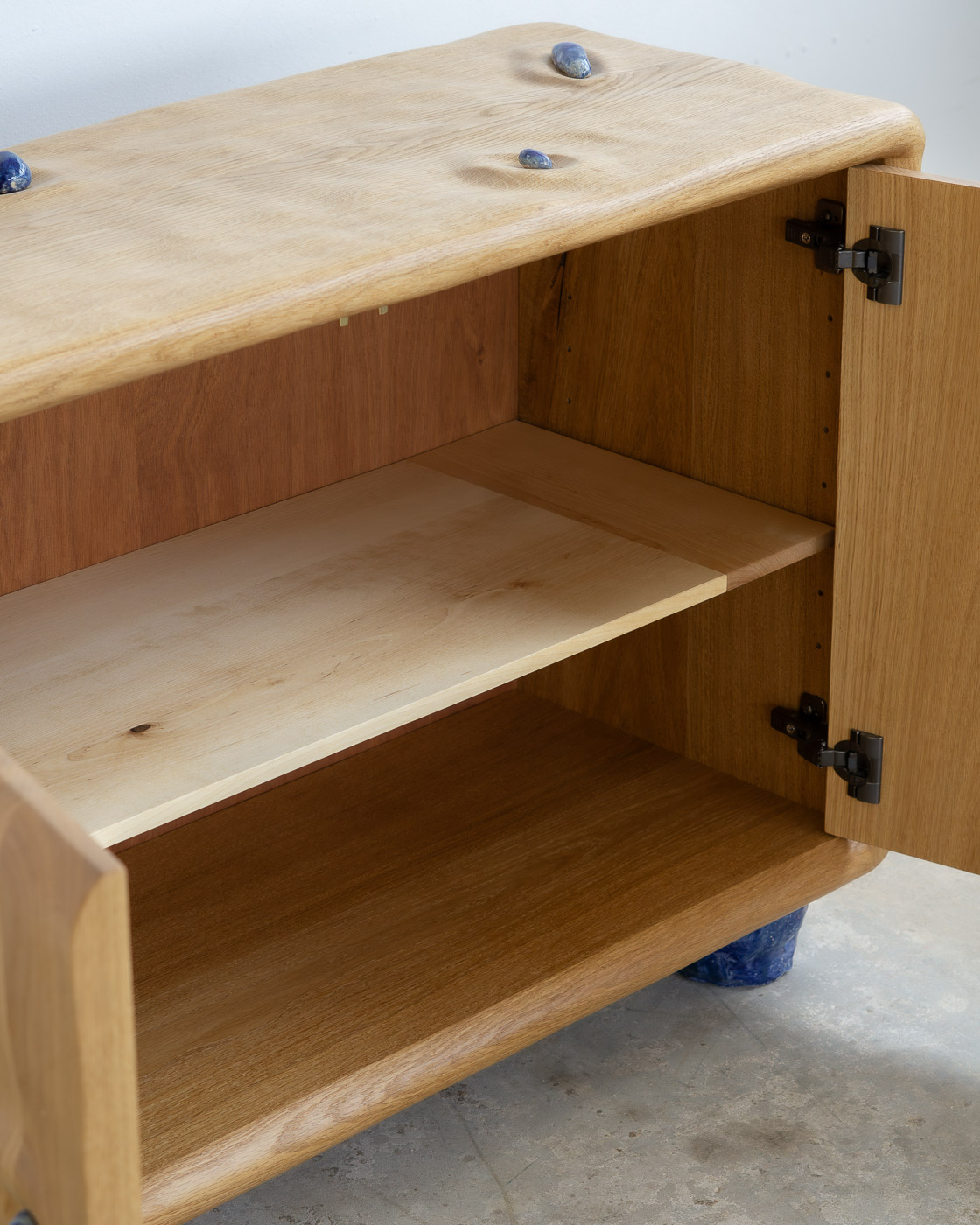 credenza in white oak with blue ceramic inlays