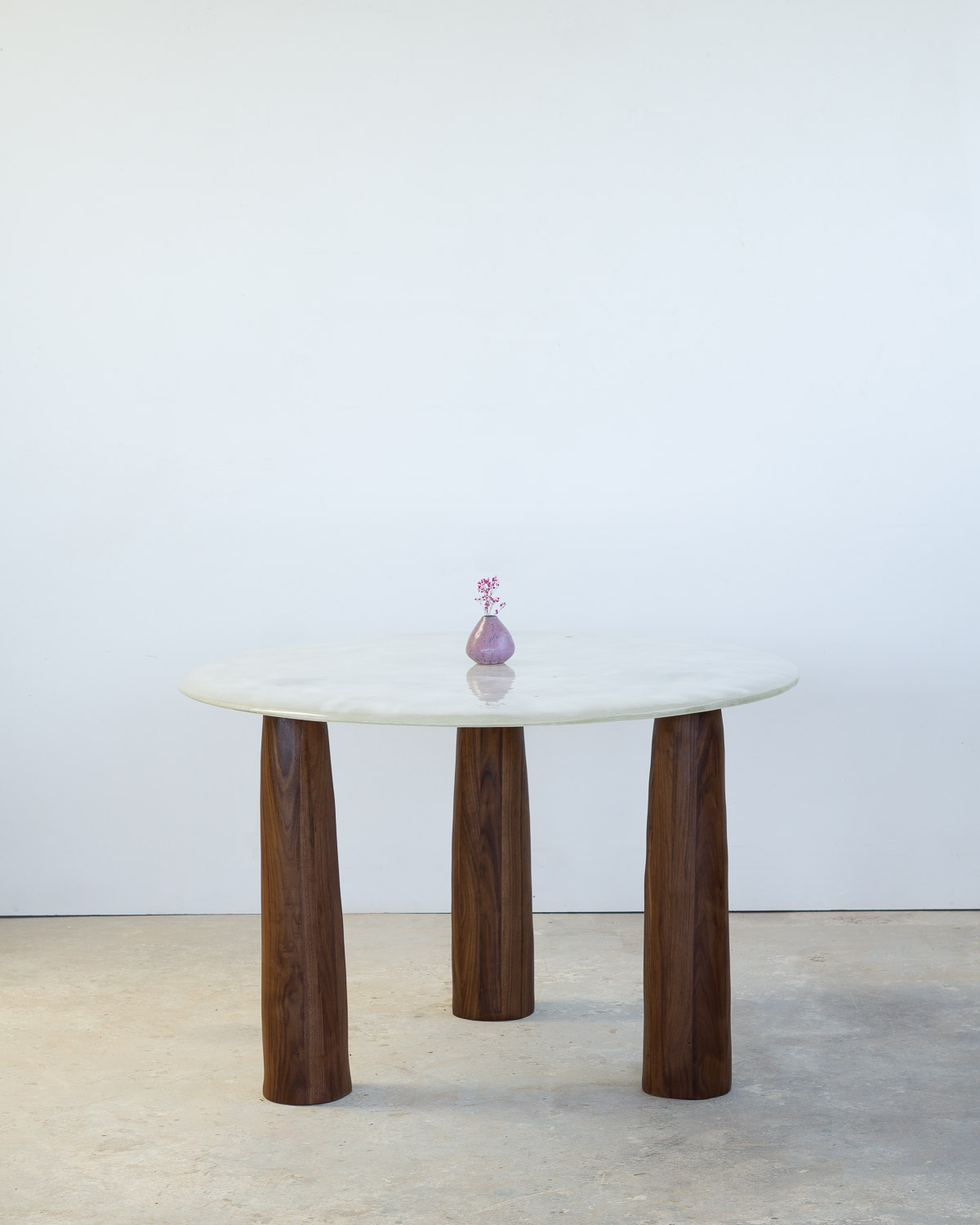fused glass dining table with opaque glass and walnut legs