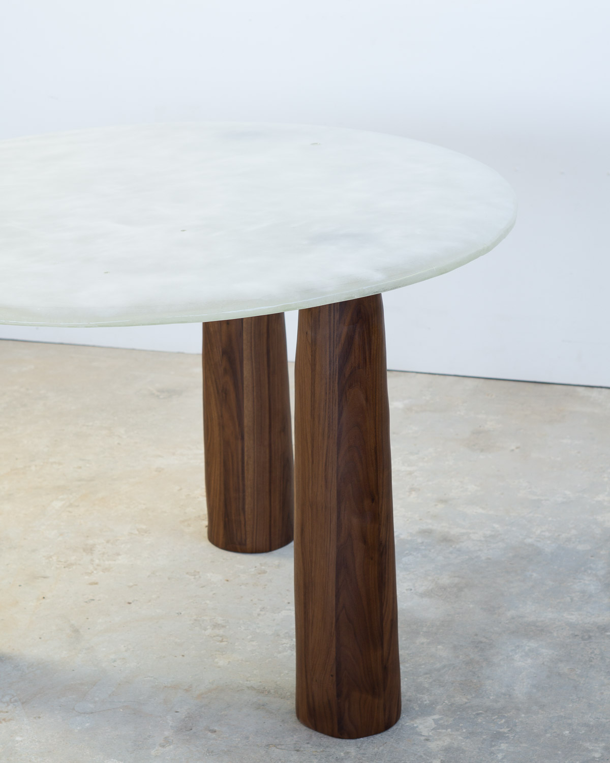 fused glass dining table with opaque glass and walnut legs