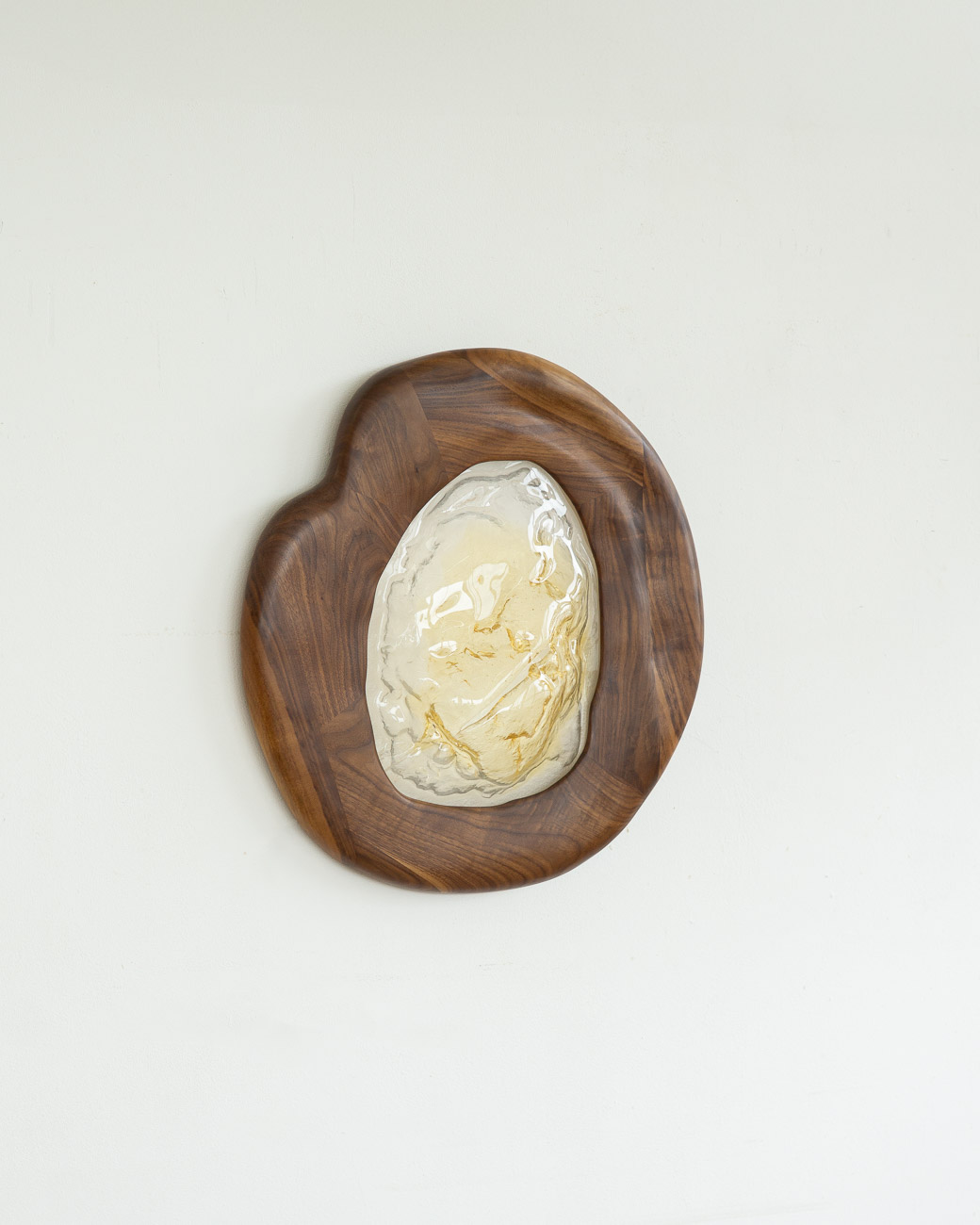 sconce made from kiln-cast glass & natural walnut