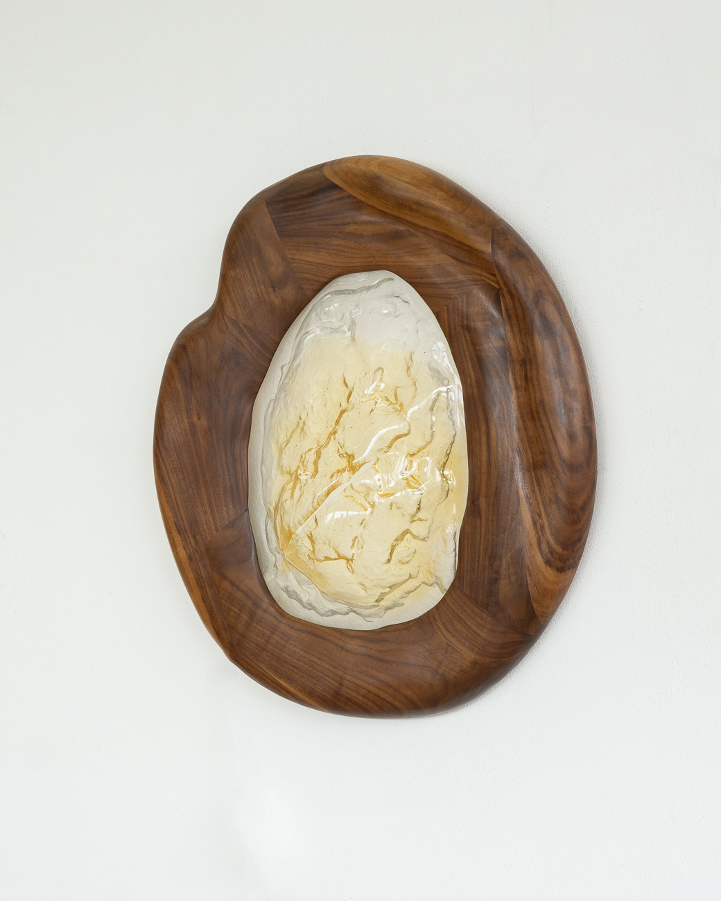 sconce made from kiln-cast glass & natural walnut