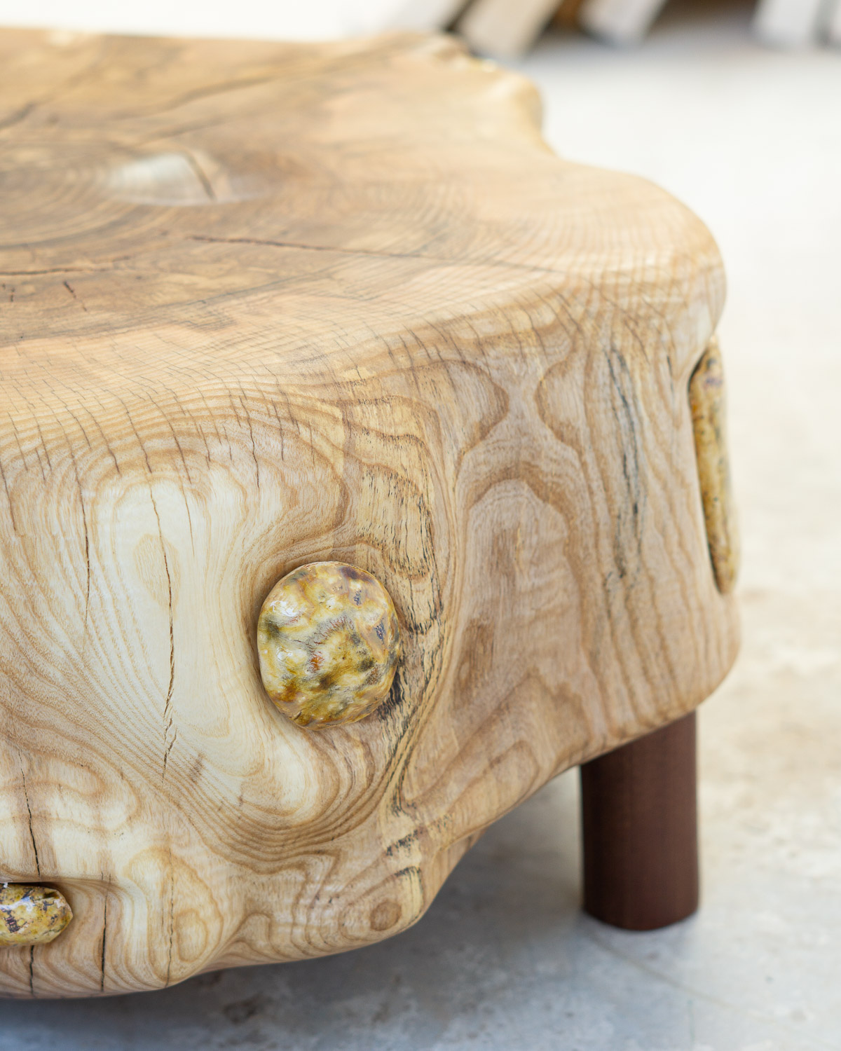 wooden stump with ceramic inlays