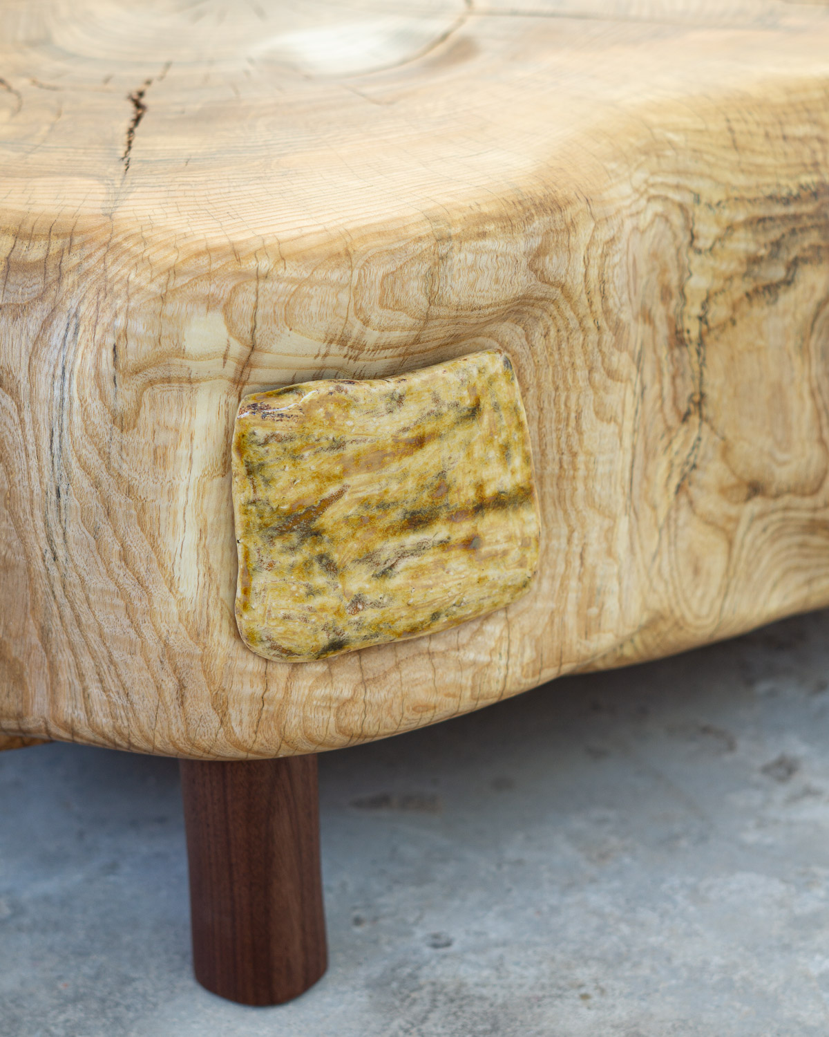 wooden stump with ceramic inlays
