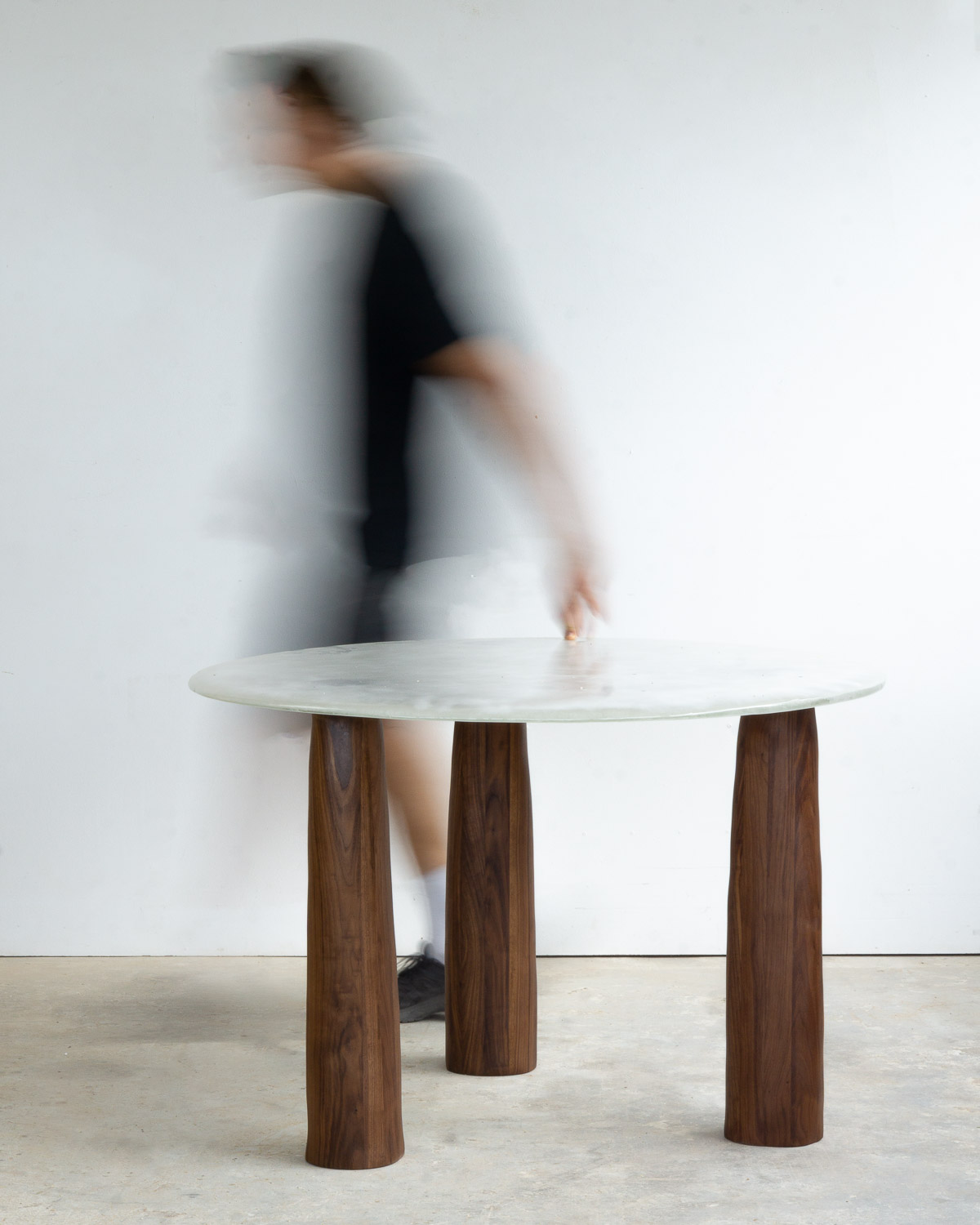 fused glass dining table with opaque glass and walnut legs