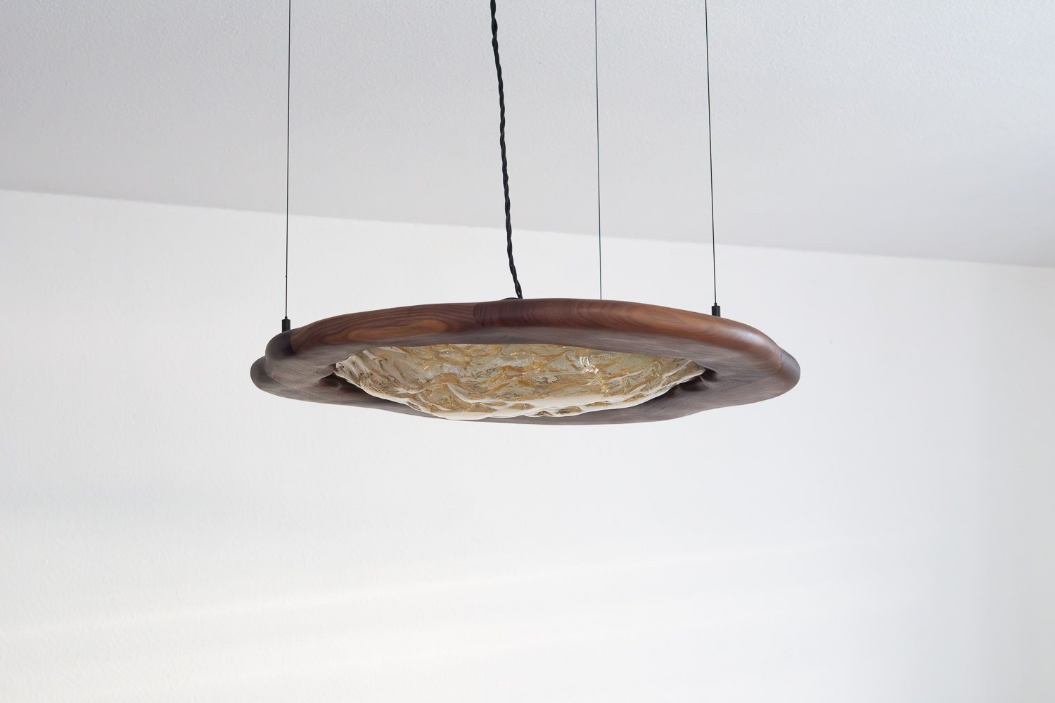 pendant light made from kiln-cast glass & walnut